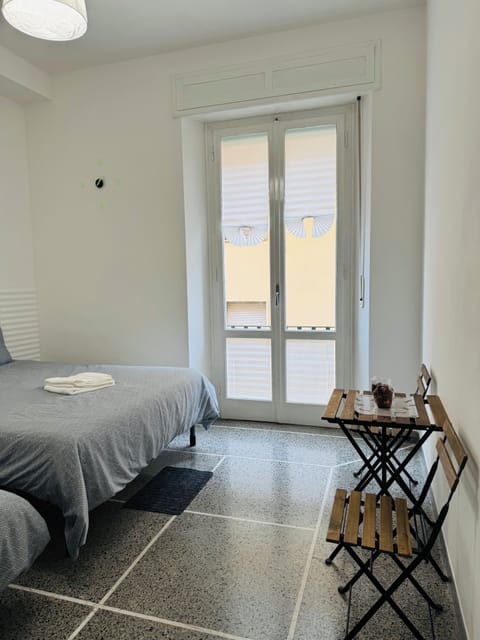 Classic Quadruple Room, City View | Desk, laptop workspace, free WiFi