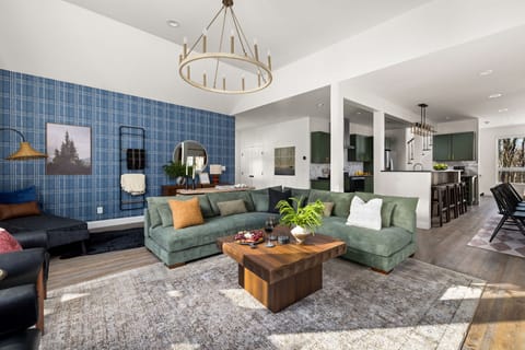 Modern design meets cozy comfort. Our stylish living room features unique accents and a warm, inviting atmosphere.