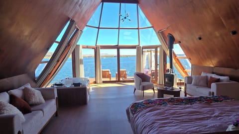 Suite, Balcony, Lake View | Down comforters, laptop workspace, bed sheets