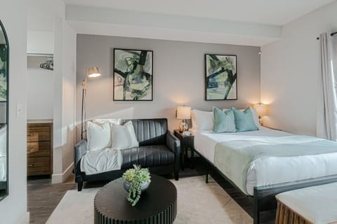 Stylish studio space with queen bed and luxury mattress, luxury sofa and walk-in wardrobe