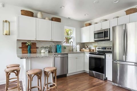 Fully stocked kitchen with island seating 