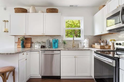 Fully stocked kitchen with island seating 