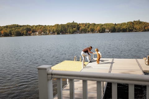 Private lakefront dock with direct water access—perfect for swimming, kayaking, paddle boarding, and enjoying the views.