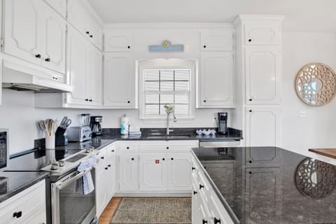 Granite counters and stainless appliances in the kitchen