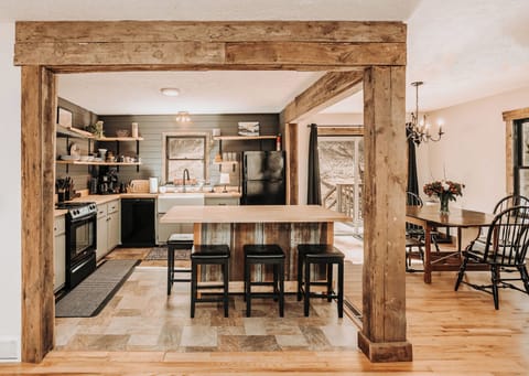 Fully stocked kitchen with reclaimed beams