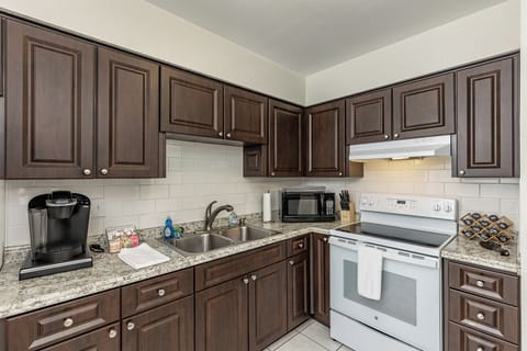 Perfect for preparing a homemade meal! Spices and wine glasses for a night in.