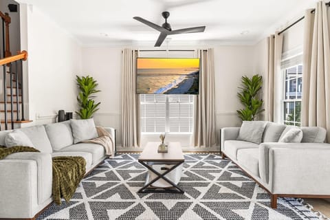 Spacious living room with cozy seating and natural light
