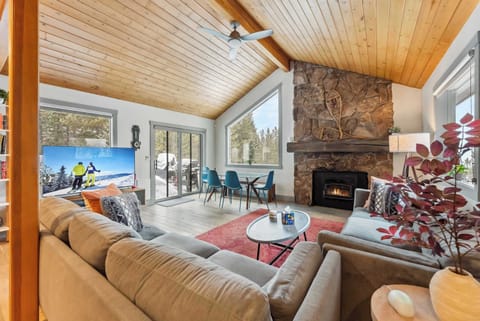 Living room 1: Main floor, wood-burning fireplace, TV with Roku, mountain views