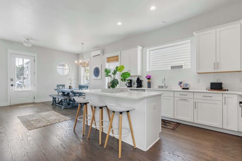 Kitchen: Main floor,drip coffee maker, keurig, crockpot, toaster, cooking utensils, tableware