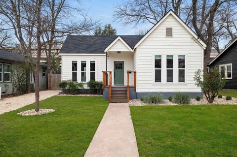 Front of the home with a private driveway