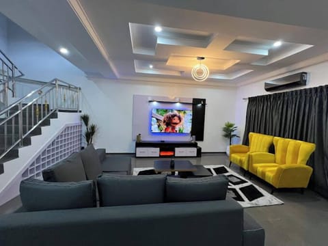Economy Apartment, Balcony, City View | Living area | Flat-screen TV