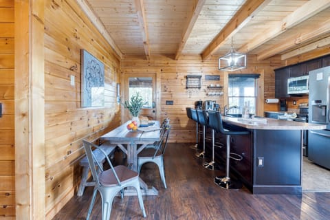 This inviting dining area is perfect for family meals, game nights, and laughter-filled conversations.