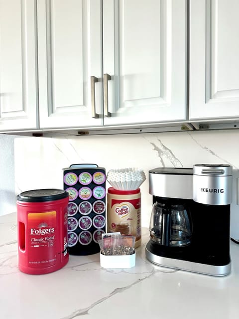 coffee pot maker, creamer, coffee grounds, filters, tea and coffee pods