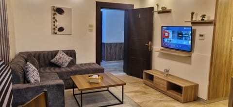 Apartment, 2 Bedrooms, Accessible, Smoking | Living room | Flat-screen TV