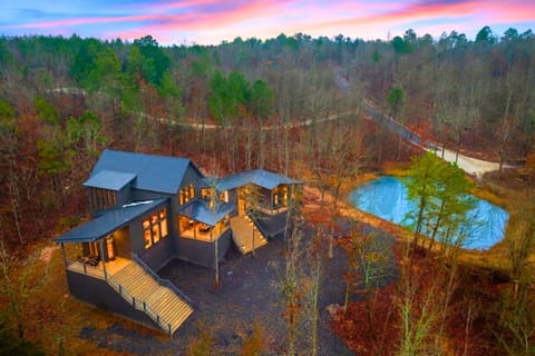 Secluded with its own private pond, on 2 acres