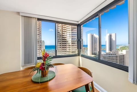 The large windows offer incredible views and natural light, creating the perfect atmosphere for your Hawaiian getaway.