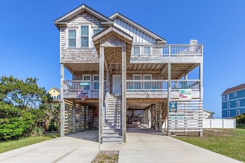 Welcome to Siren's Serenade, a stunning 4-bedroom, 3.5-bathroom vacation retreat nestled just three lots from the beach.