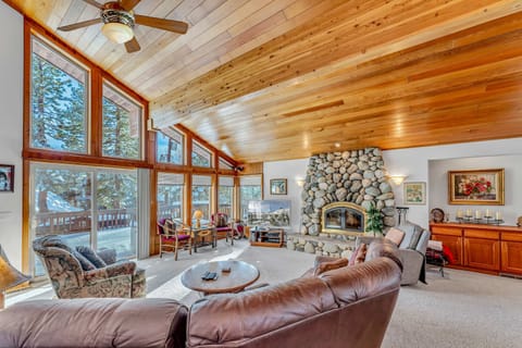 Living room: Smart TV, wood burning fireplace, main floor