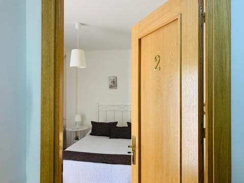 Standard Penthouse | Down comforters, desk, laptop workspace, free WiFi