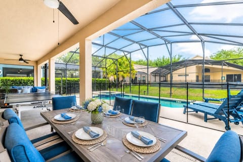 Private Lanai with fenced pool, dining seating, lounge seating and Ping Pong table!