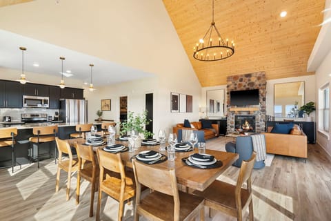 Main living spaces are on the upper floor of this home: Open kitchen with dining seating for the whole family!