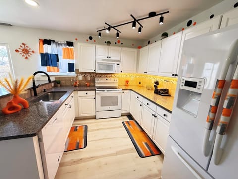 Fully equipped kitchen. Cook, dine, and enjoy in style!