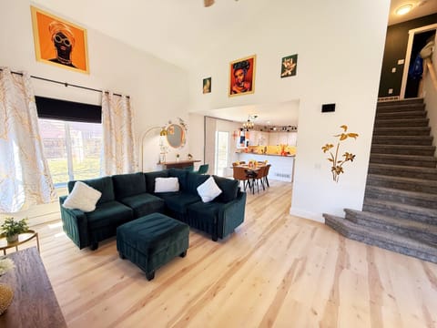 Step into a cozy and stylish retreat designed for comfort and connection. With plush seating, warm natural light, and a welcoming ambiance, it's the perfect space to unwind or gather with love