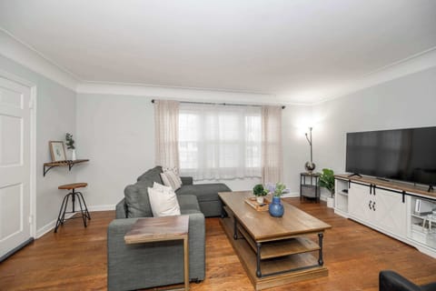 Curl up in the chic living room & stream your favorites on the smart TV