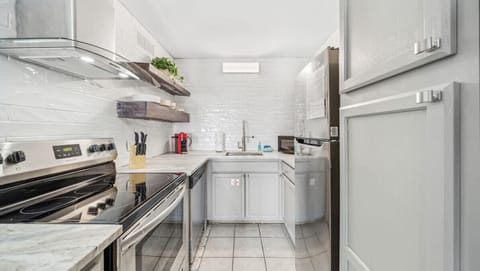 Newly remodeled kitchen with floating shelves
