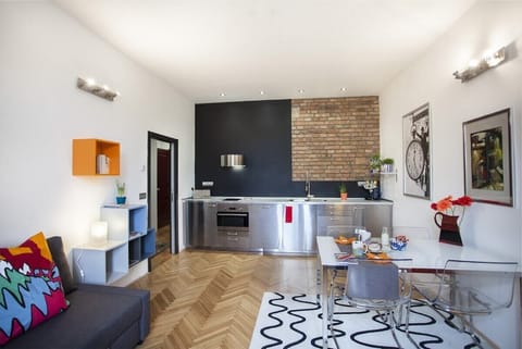 River view living room with kitchen and fold out extra bed
