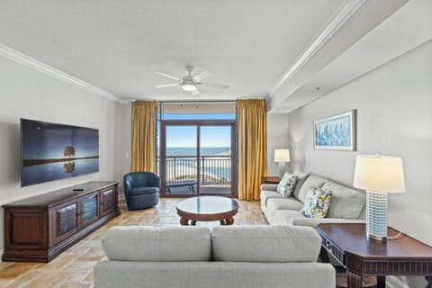 Let in the sun rays as you relax in the comfort of this living room with a view.