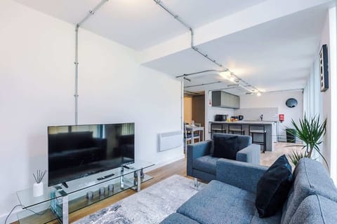 Transform your TV time into pure comfort with a cosy sofa and armchair, your ultimate chill zone