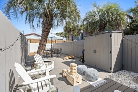 Giant Jenga, Corn Hole, Tic Tac Toe, Adirondack Chairs & Outdoor Dining set! What more do you need for a relaxing night in after fun in the sun?!