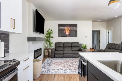 Minimalist living space with glowing LED fireplace