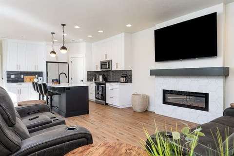 Minimalist living space with glowing LED fireplace