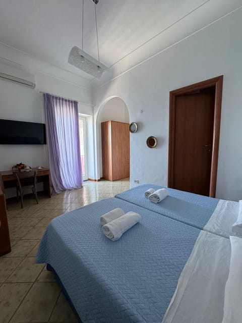 Deluxe Double or Twin Room, Balcony, Sea View | In-room safe, desk, iron/ironing board, free WiFi