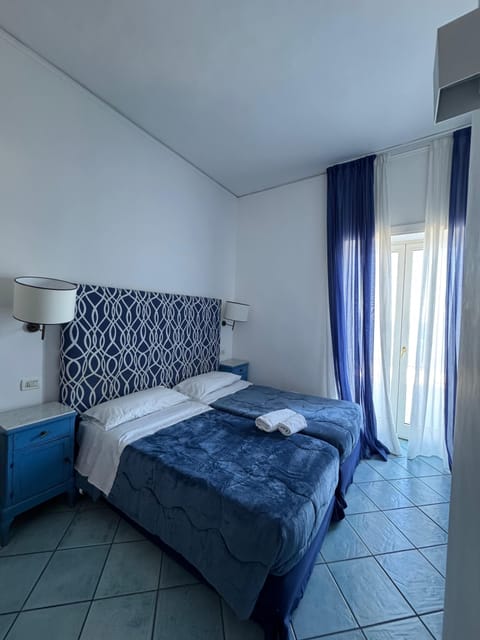 Deluxe Double or Twin Room, Balcony, Sea View | In-room safe, desk, iron/ironing board, free WiFi