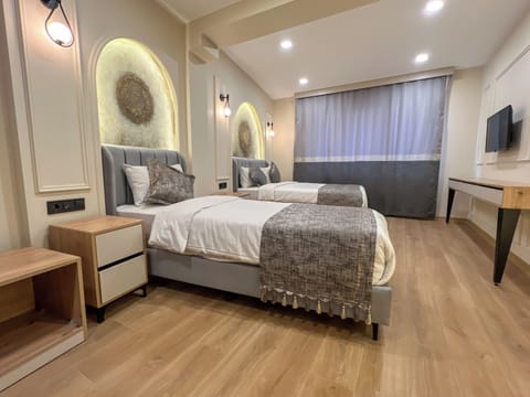 Comfort Triple Room | Minibar, in-room safe, iron/ironing board, free WiFi