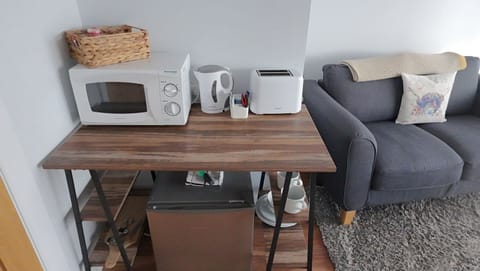 Comfort Studio, 1 Double Bed, Patio, Hill View | Living area | TV