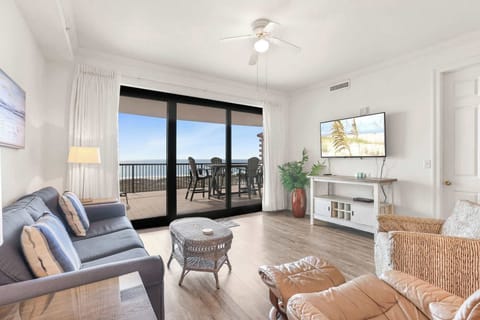 Spacious Living Room with Balcony Access 