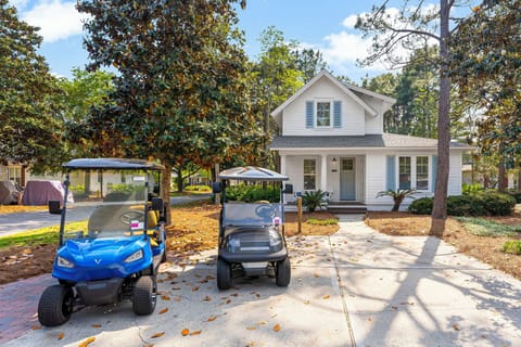 Two Golf Carts and Private Driveway Parking