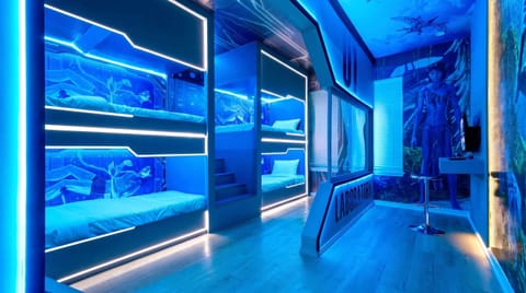 Futuristic neon bunk room with immersive lighting and sci-fi themed design