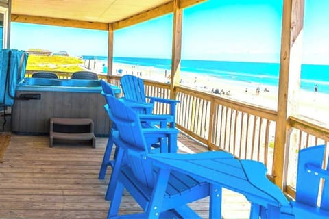 #1 Best location in surfside! Front porch with hot tub, Adirondack chairs and UNBELIEVABLE ocean views! Watch the sunrise with a fres cup of coffee from the comfort and privacy of the hot tub. Watch the kids play on the beach from a shady perch!