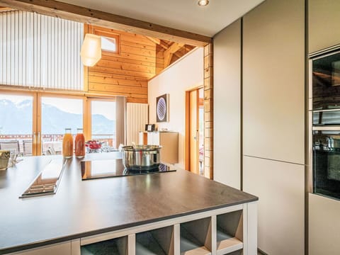 Kitchen, Interior Design, Flooring, Wood, Countertop, Ceiling, Cabinetry, Furniture, Floor, Light Fixture