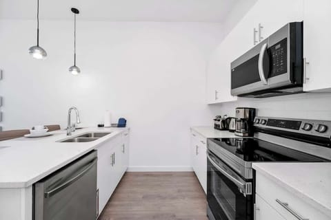 A fully stocked kitchen with all the appliances you need to whip up delicious meals!