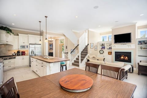 View of the kitchen and family room from the dining area.