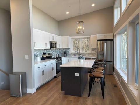 Modern kitchen with all the amenities. Plenty of sunlight and amazing view. 