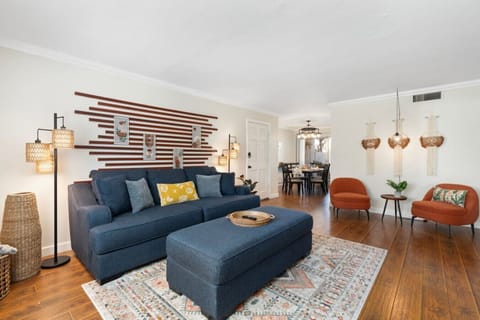 Bright, airy space with chic seating, warm lighting, and vibrant vibes!