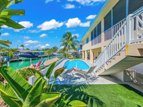 Enjoy a beautiful day by your private pool, relaxing on a lounger with your favorite book in hand.