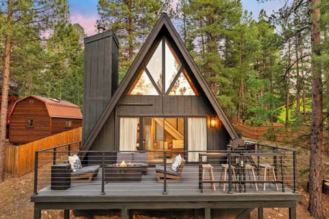 Sip, Grill, and Unwind on This Beautiful Cabin Deck